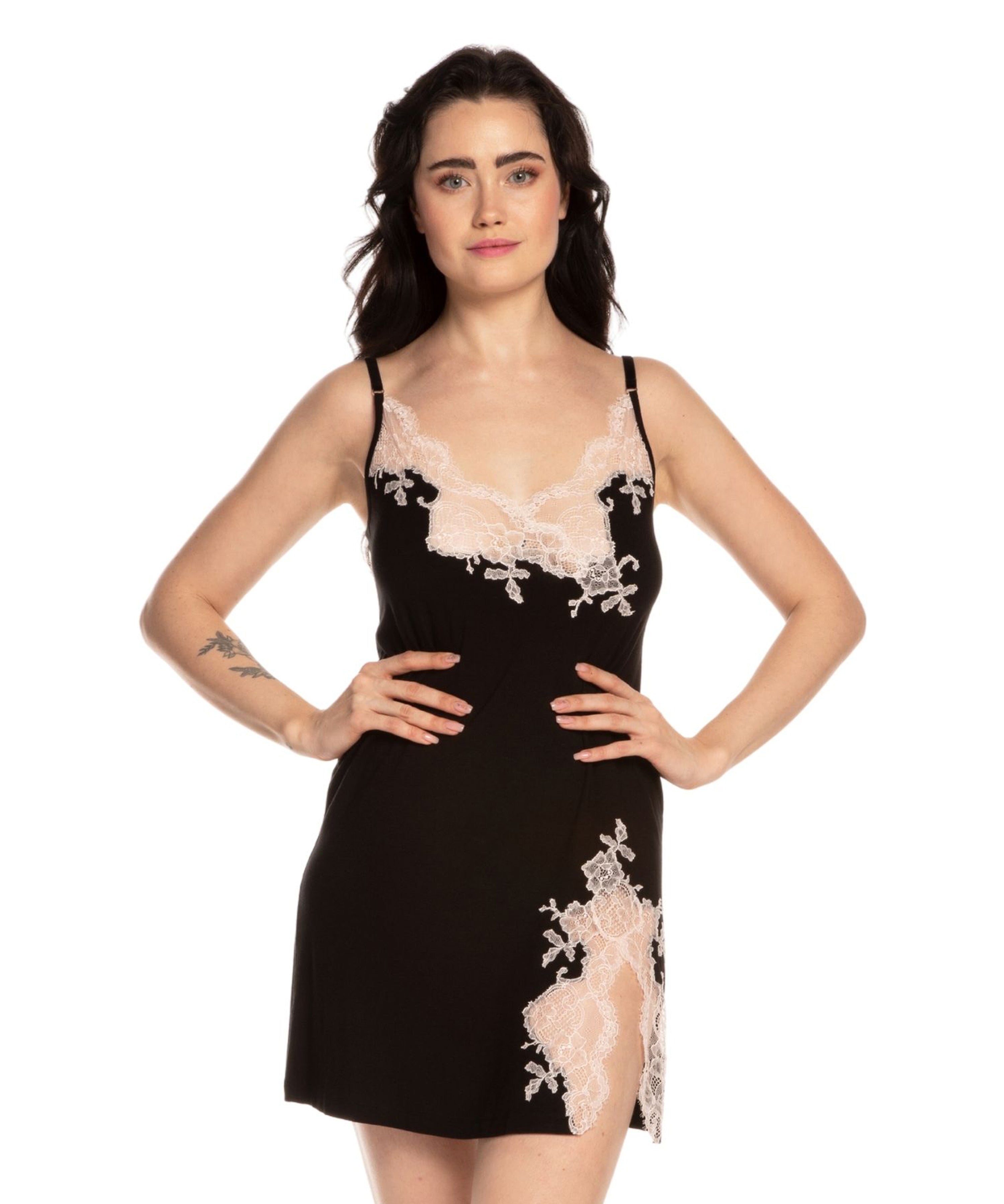 Effetto bamboo chemise spaghetti strap 03162 – women's sleepwear, black
Woman wearing a black lace-trimmed dress on a white background