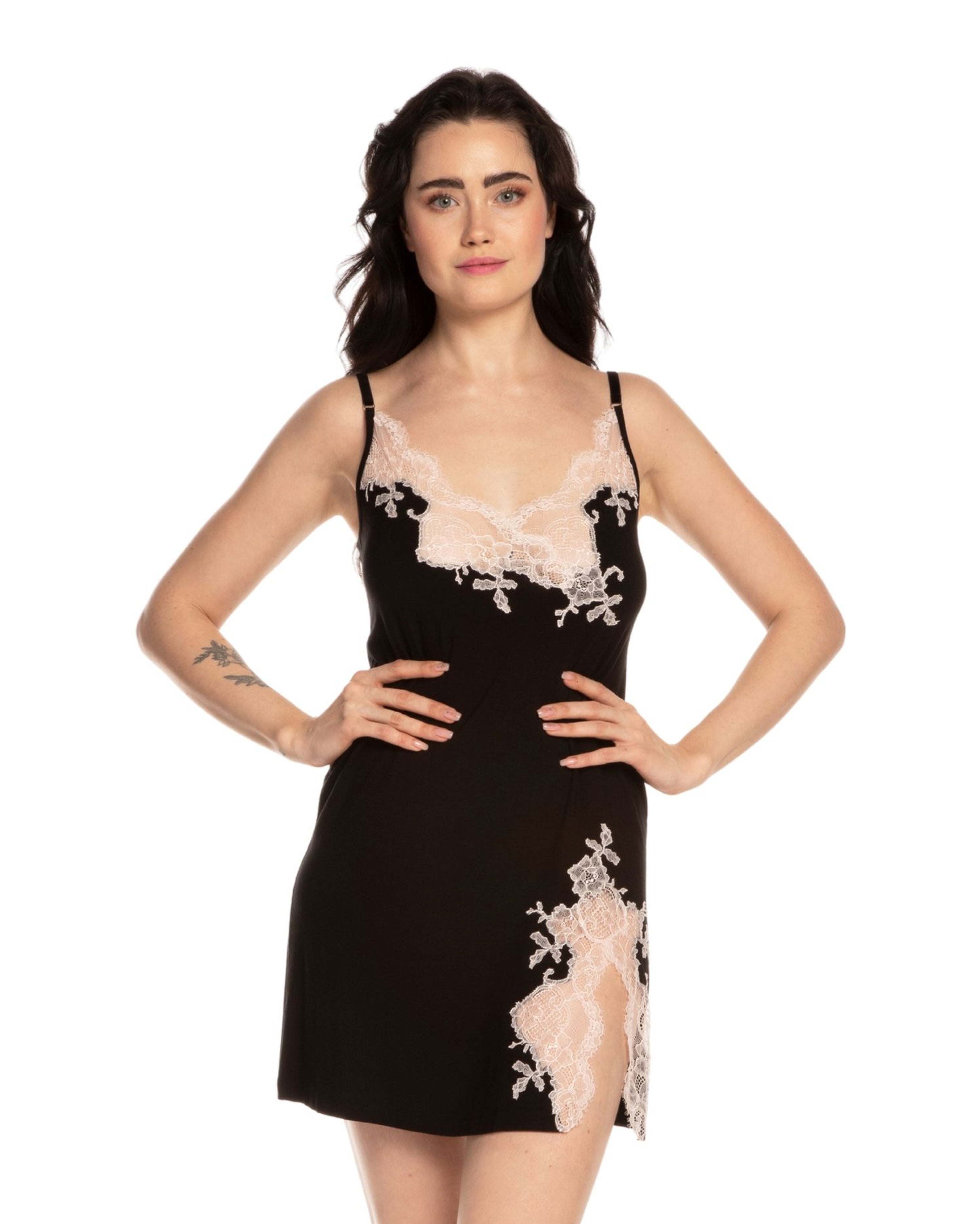 Effetto bamboo chemise spaghetti strap 03162 – women's sleepwear, black
Woman wearing a black lace-trimmed dress on a white background