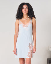 Effetto bamboo chemise spaghetti strap 03162 – women's sleepwear, icy blue
Woman wearing a light blue slip dress with lace details on a plain background
