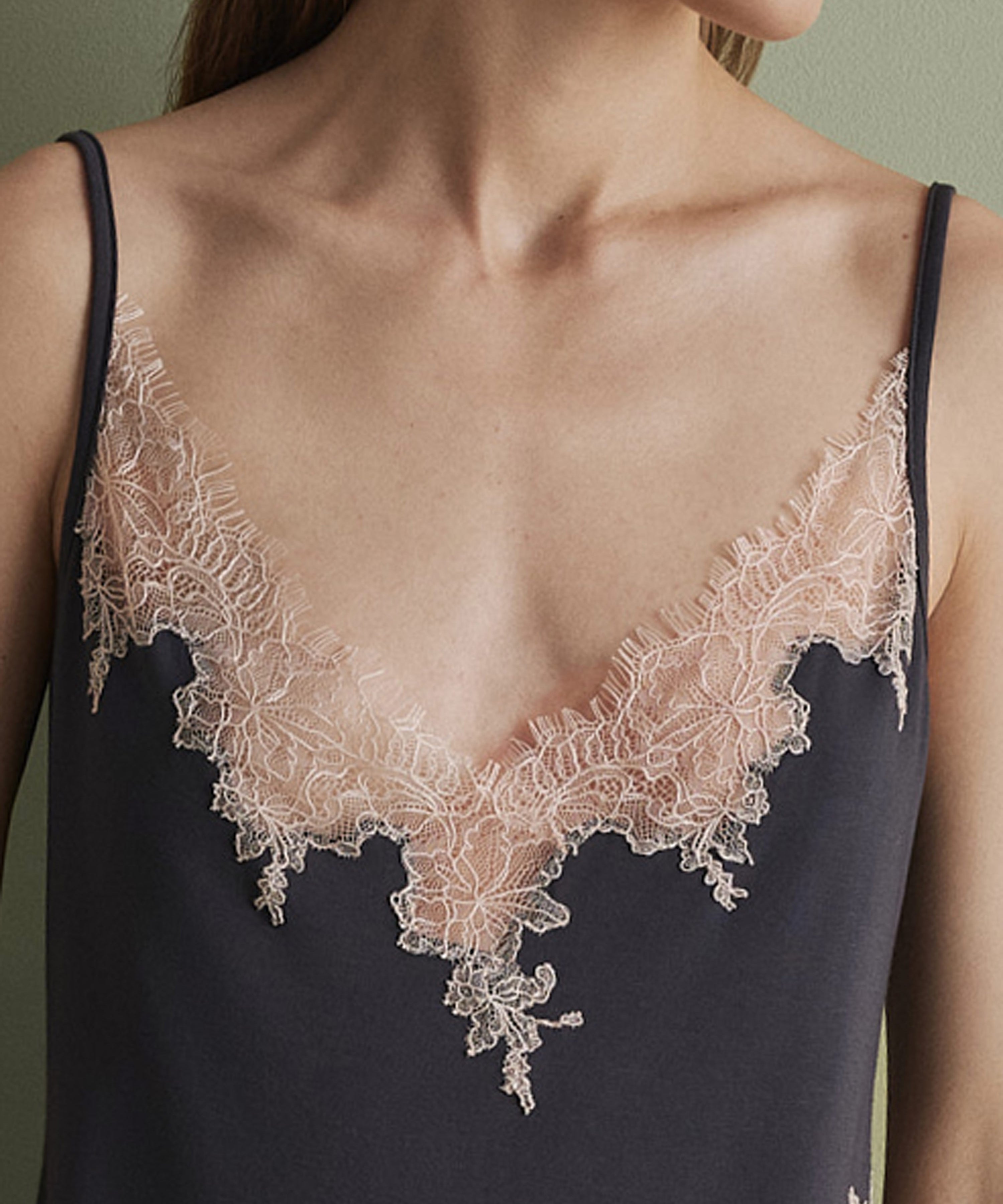 Effetto bamboo camisole pajama set 03163 – women's sleepwear, smoke grey
Black slip dress with lace detailing on a plain background