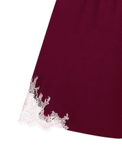 Effetto bamboo cami shorts set 03163 – women's sleepwear, cherry lacquer
Close-up of a burgundy garment with lace trim on a white background