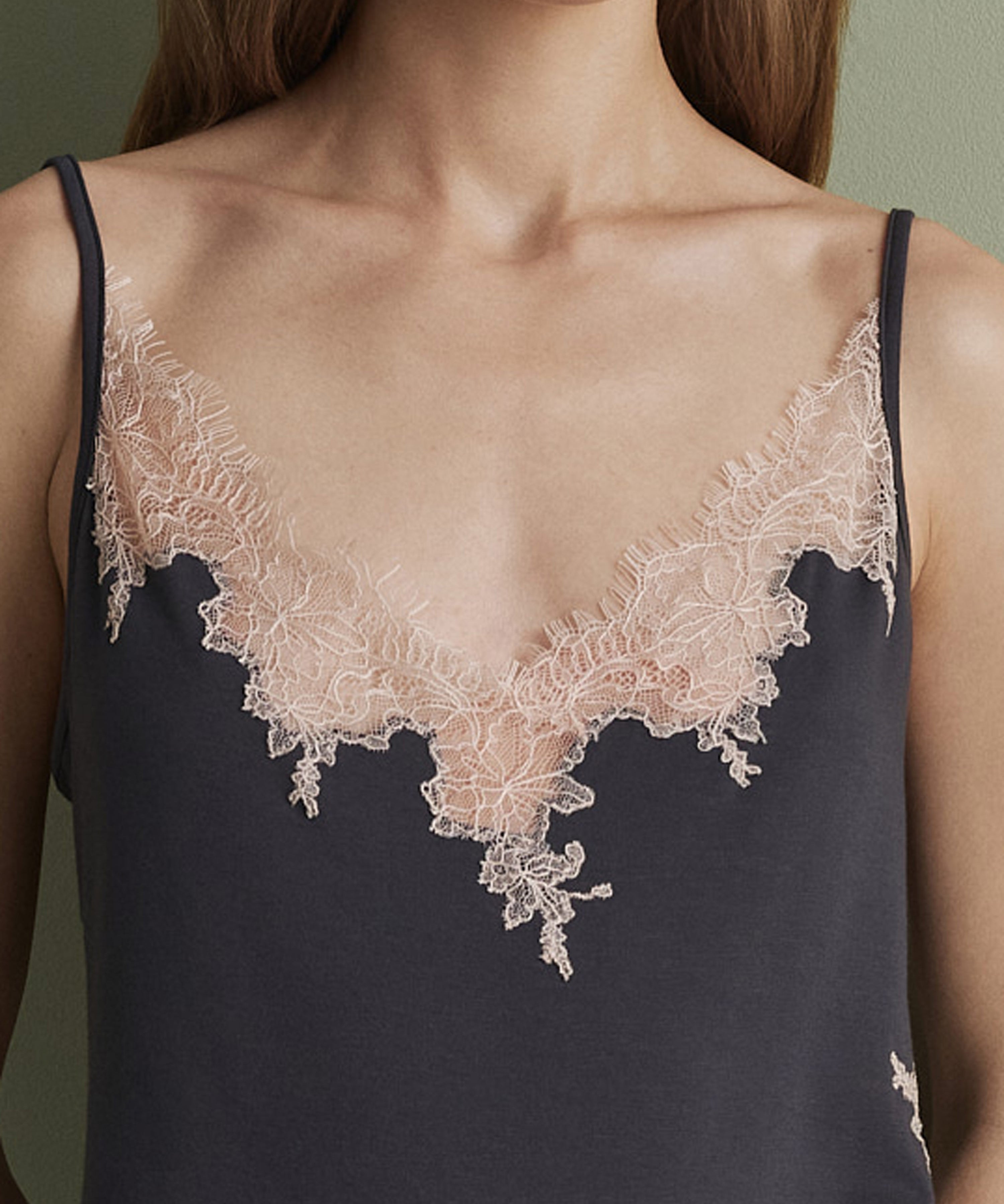 Effetto bamboo cami shorts set 03163 – women's sleepwear, smoke grey
Black sleeveless top with lace detailing on a plain background