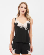 Effetto bamboo cami shorts set 03163 – women's sleepwear, black

Woman wearing a black lace-trimmed top and shorts set on a white background