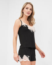 Effetto bamboo cami shorts set 03163 – women's sleepwear, black
Woman wearing a black lace-trimmed top and shorts set on a white background