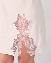 Effetto bamboo chemise spaghetti strap 03162 – women's sleepwear, rosy peach
Close-up of a white lace garment on a plain background